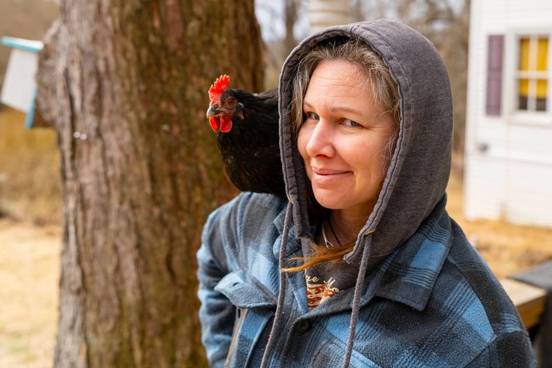 Farmer working in a rustic barn with warm natural light